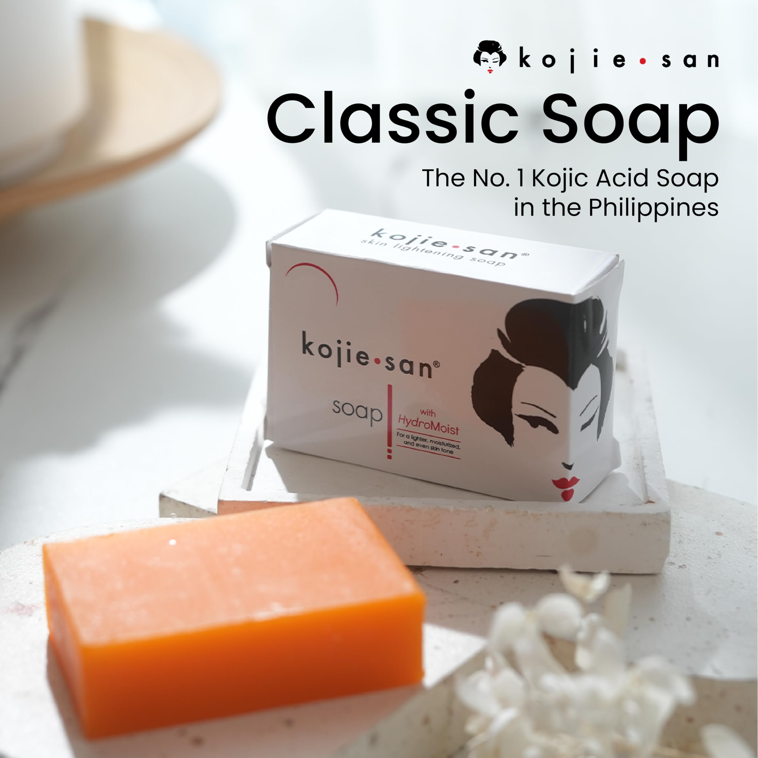 Kojie San soap lather foam on skin demonstrating gentle cleansing and brightening effect