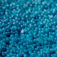 KoluaWax close-up of hard wax beads texture highlighting easy melting and smooth application