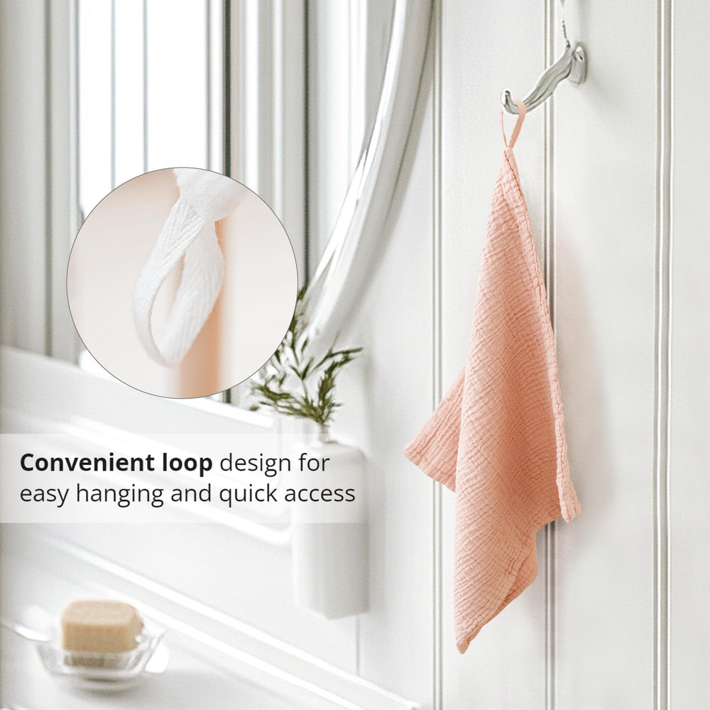 Konssy cloth held in hand to show 11x11 size and portable, travel-ready benefit