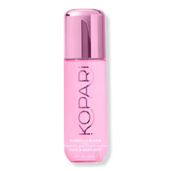 Kopari bottle front view showing clean design and floral appeal