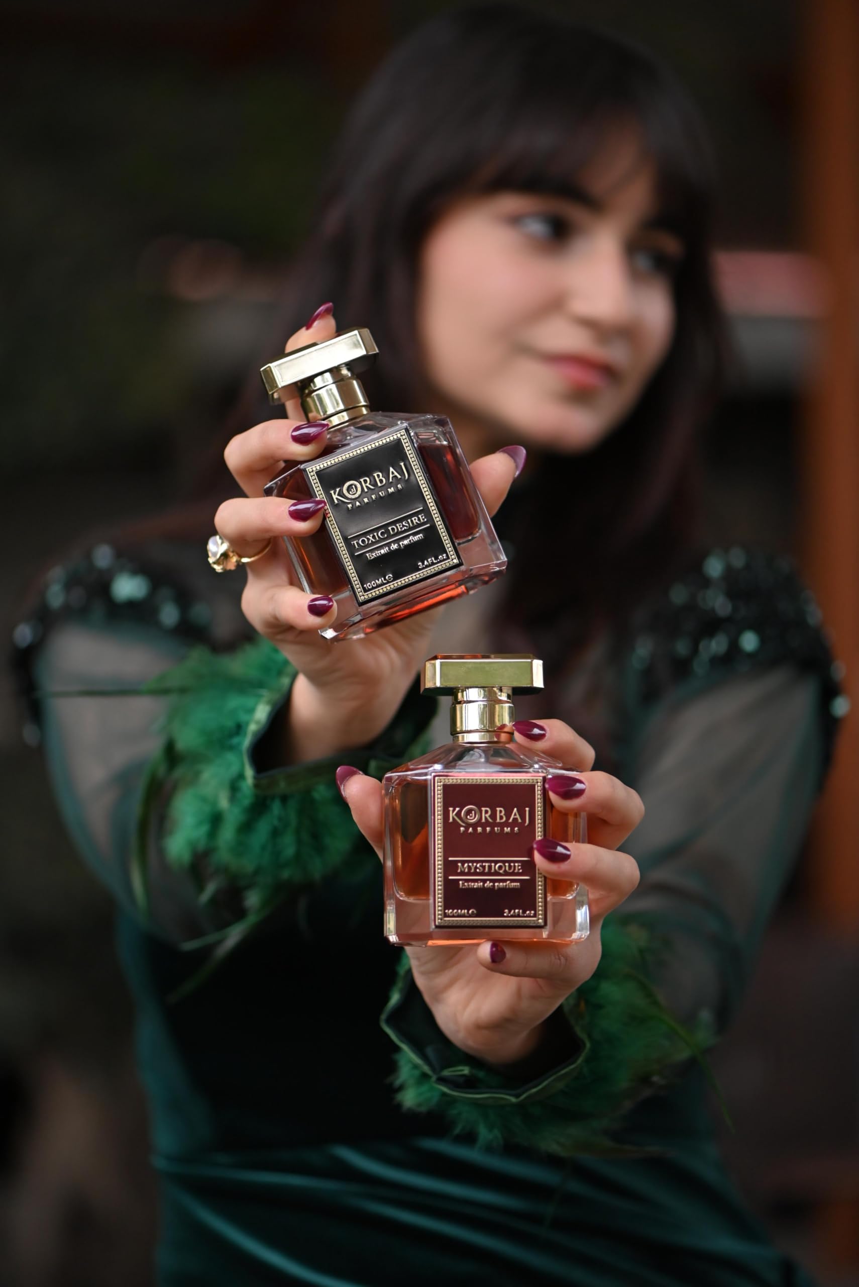 KORBAJ PARFUMS bottle staged on table with accessories showing lifestyle elegance
