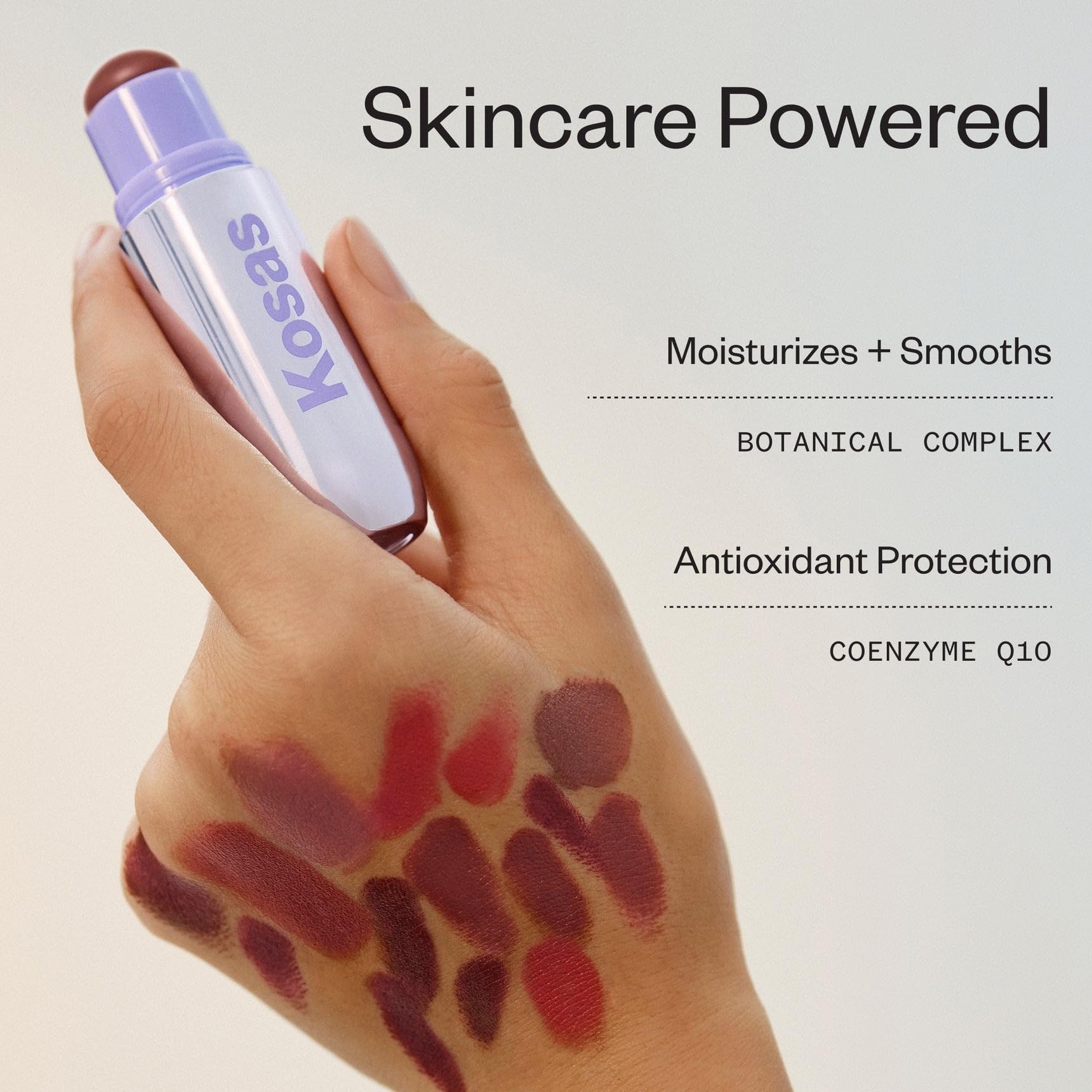 Kosas product applied to lips showing unified monochrome color benefit