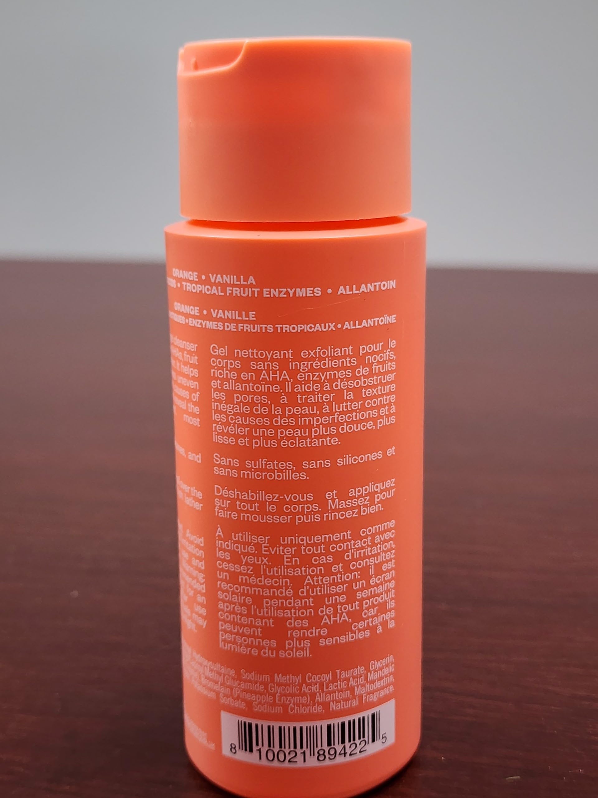 Kosas bottle next to ruler showing real size for packaging clarity