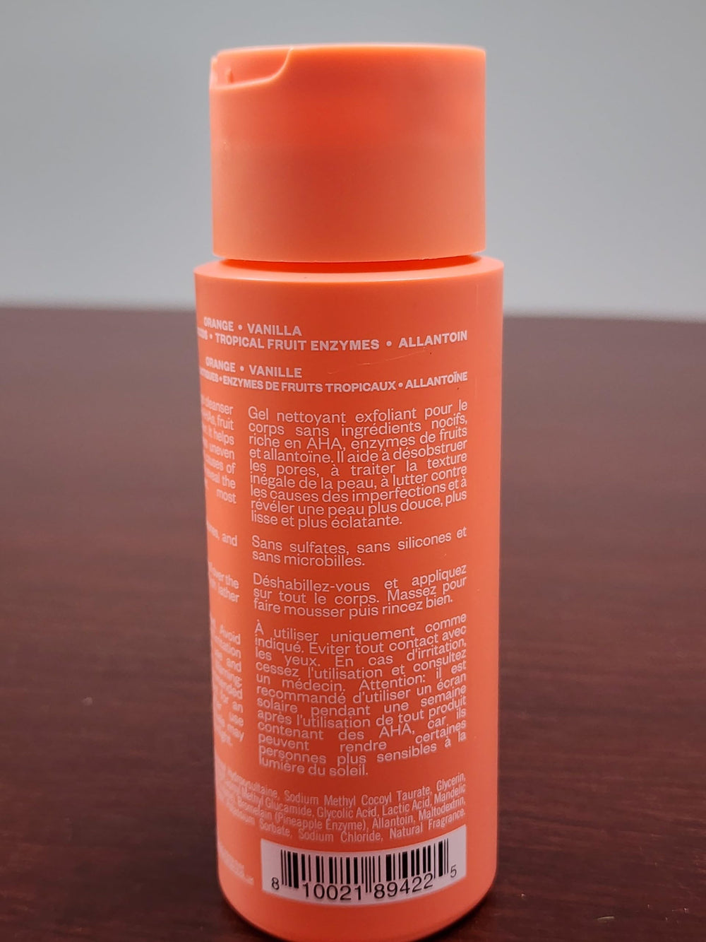Kosas bottle next to ruler showing real size for packaging clarity