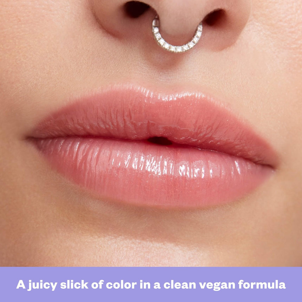 Kosas gloss in a purse lifestyle shot for quick touch-ups and on-the-go hydration