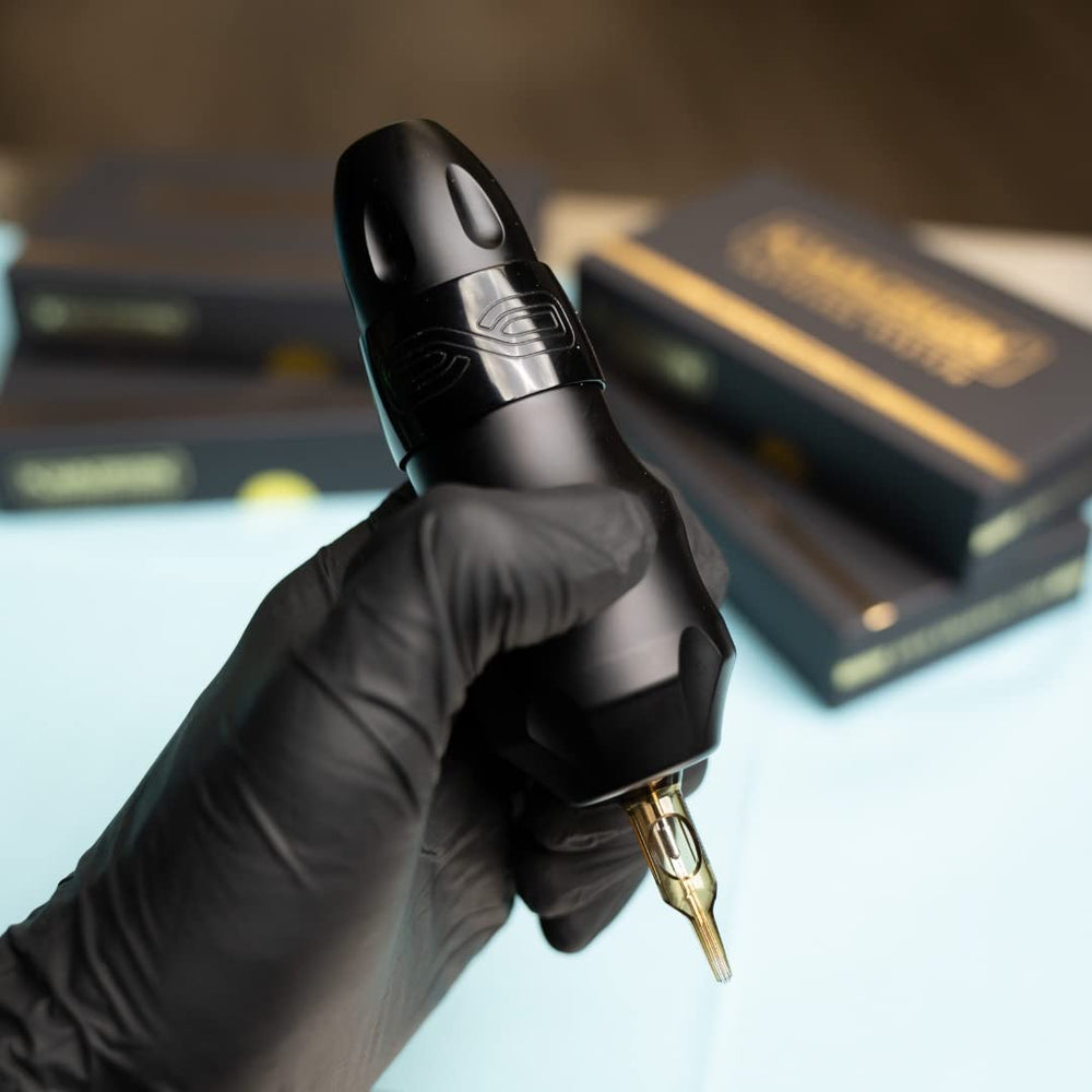 Kwadron cartridge next to pen showing compact size and practical scale