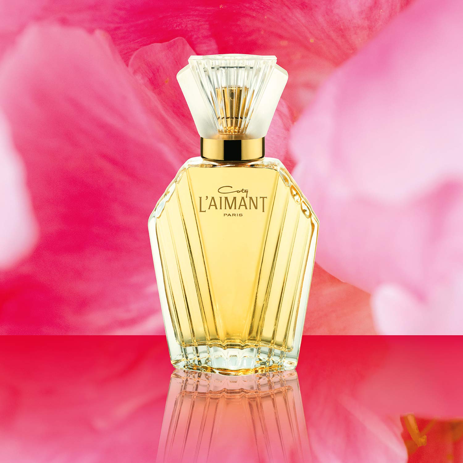 L'Aimant by Coty fragrance texture detail highlighting powdery-musk character benefit