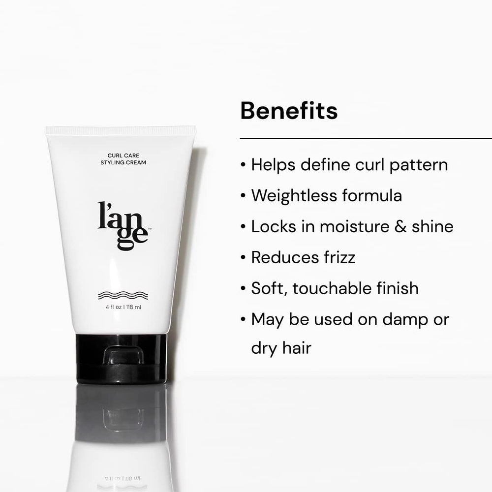 L'ANGE HAIR cream in hand for scale showing lightweight feel and easy application