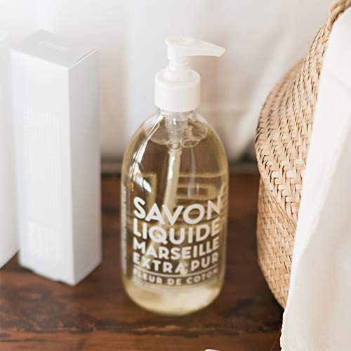 La Compagnie de Provence oils display with olive and almond illustrating nourishing ingredient benefit