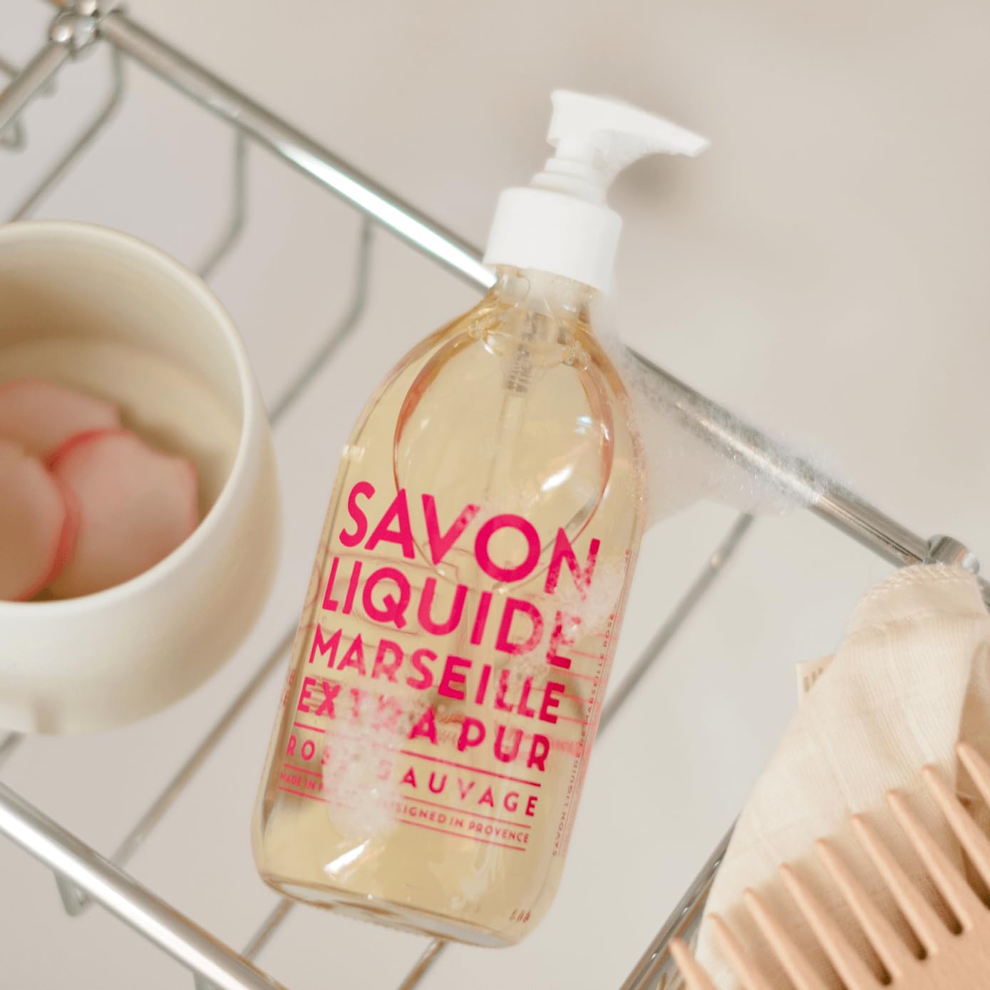 La Compagnie de Provence beside kitchen sink with towel benefit: versatile for home use