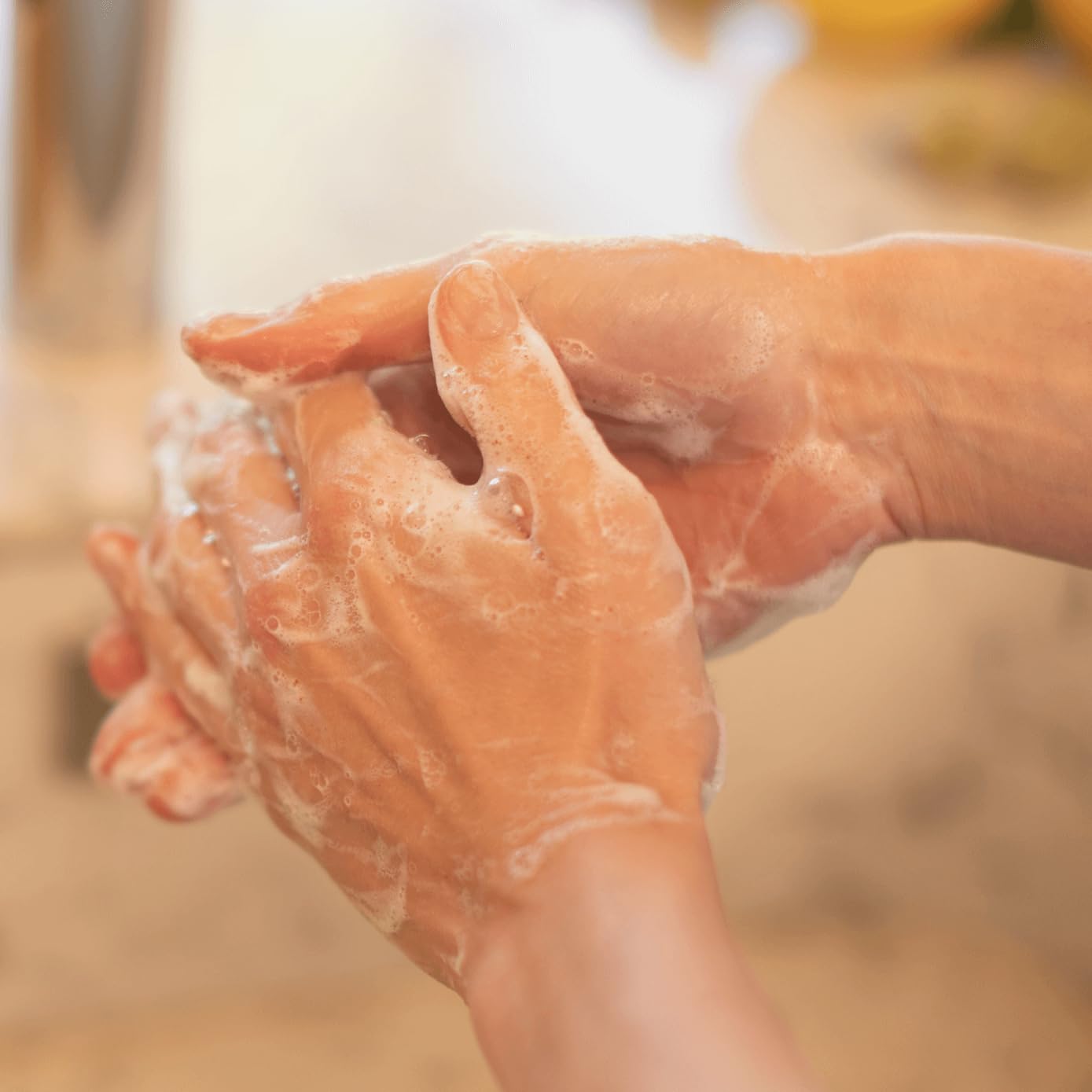 La Compagnie de Provence pouring refill into bottle benefit: refillable glass reduces plastic waste