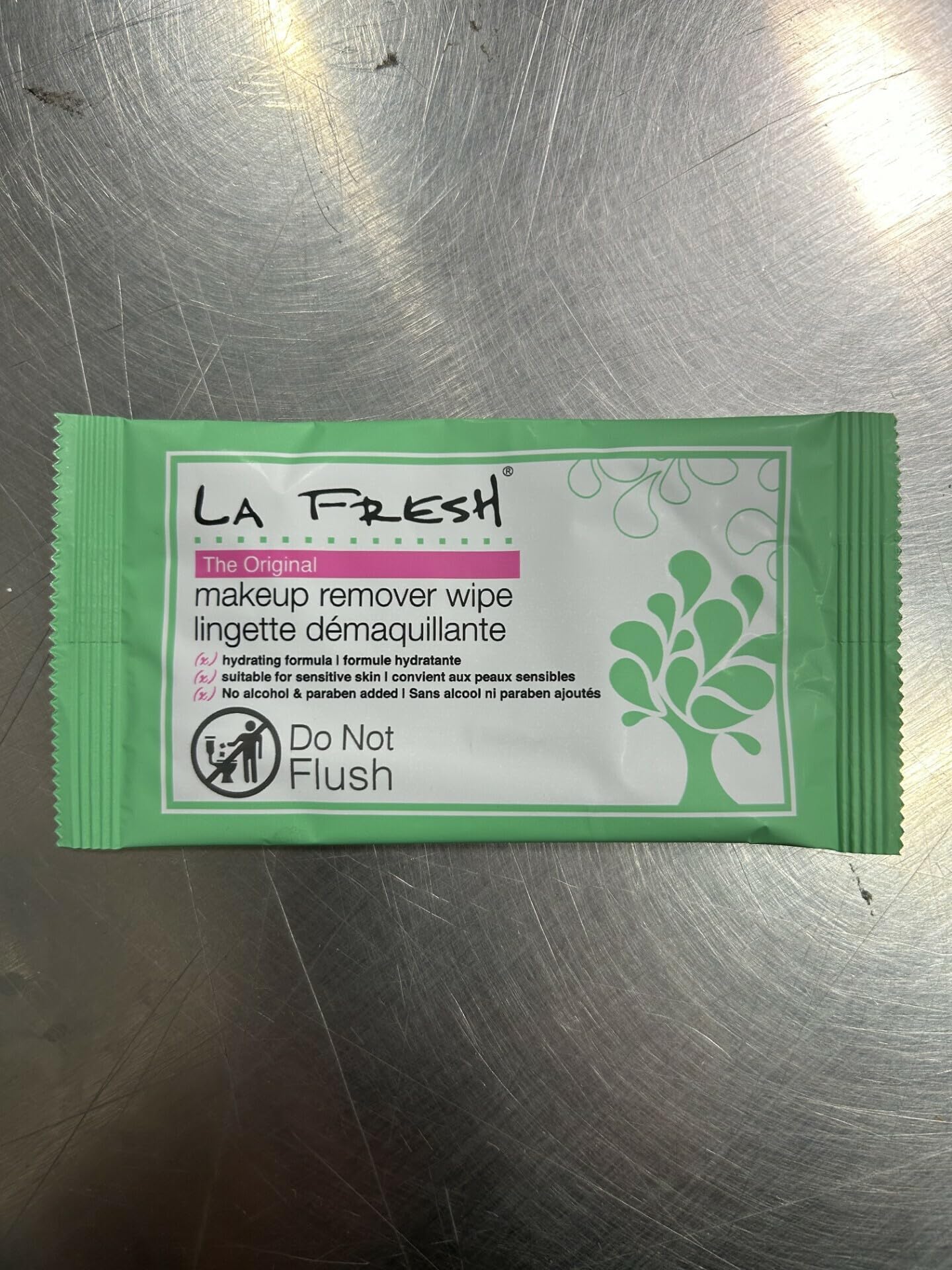 LA Fresh single wipe opened demonstrating moist texture and ease