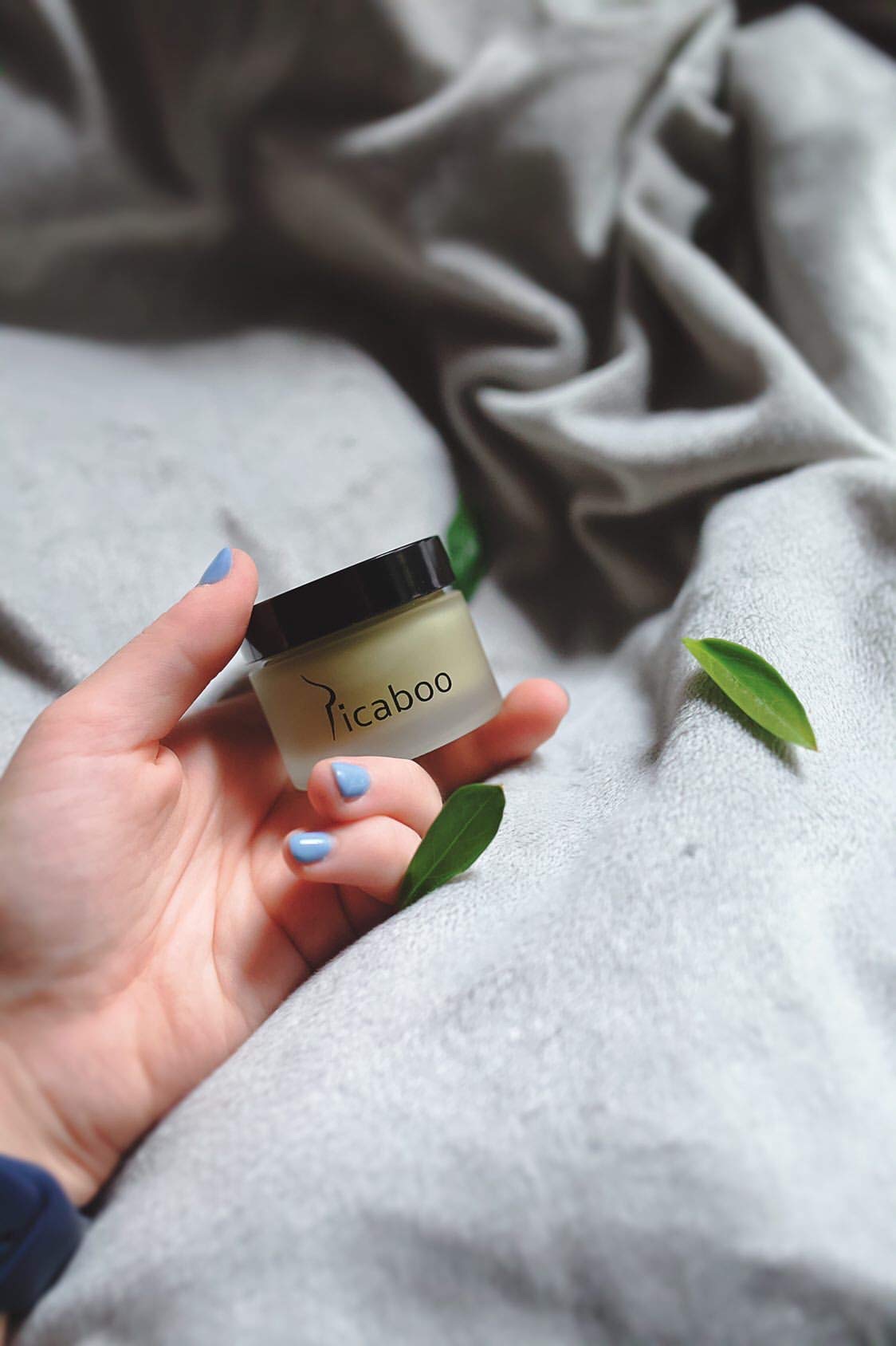 La Parea Wellness stick applied to skin demonstrating targeted relief and friction protection