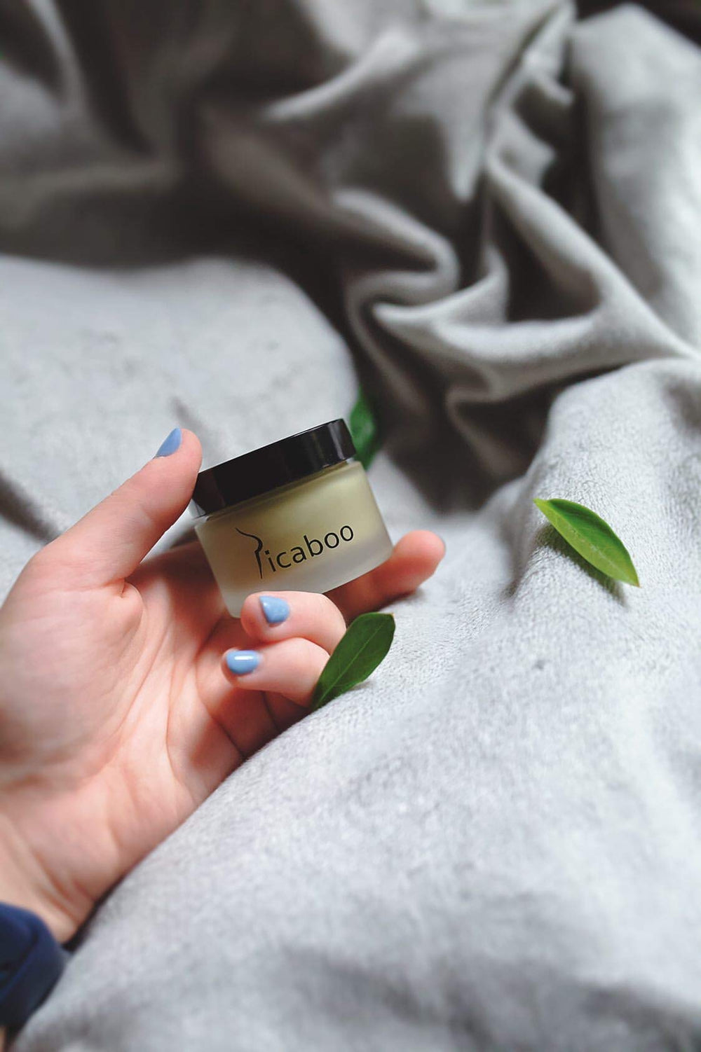 La Parea Wellness stick applied to skin demonstrating targeted relief and friction protection