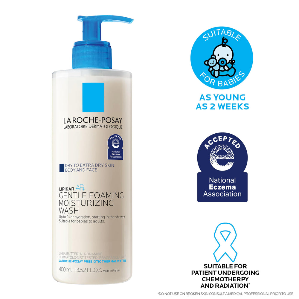 Bottle held in hand for scale, showing 13.52 oz size clarity and portability