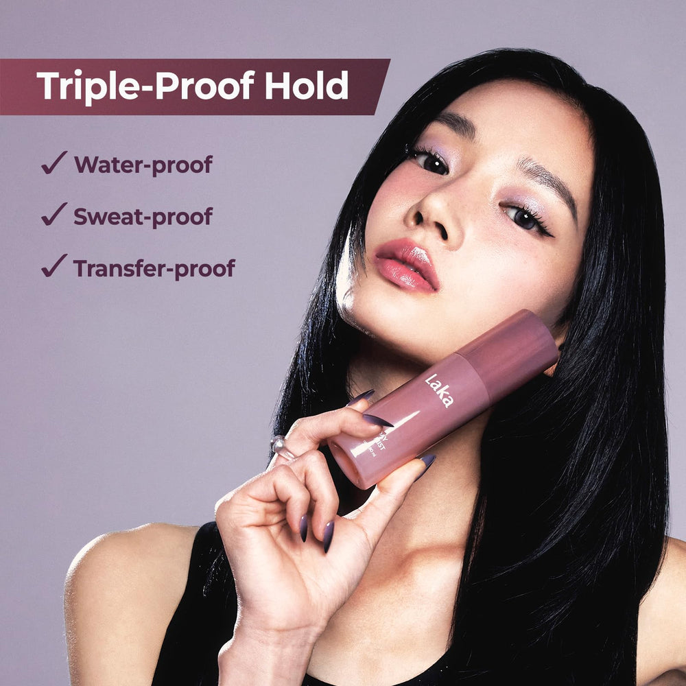 Model using Laka mist to refresh makeup for long wear benefit