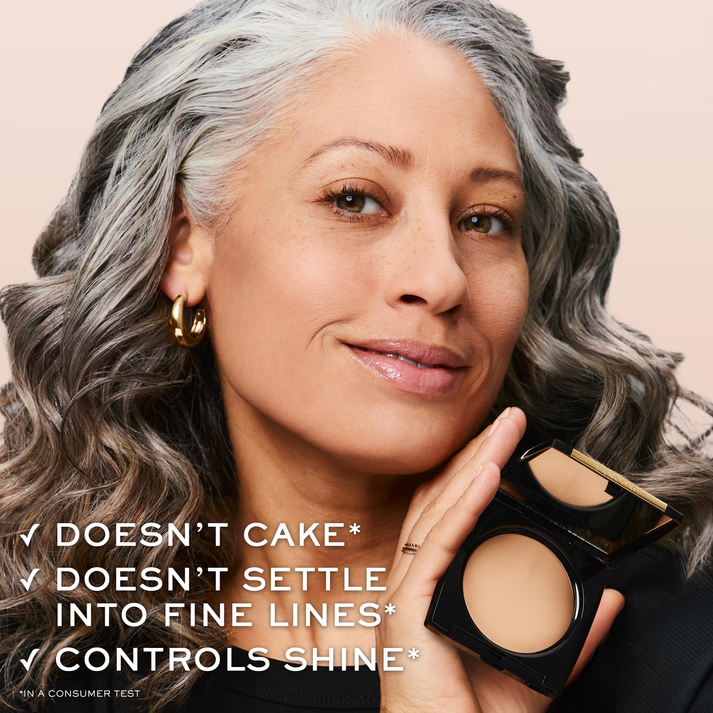 Lancôme compact in hand illustrating true size and on-the-go convenience