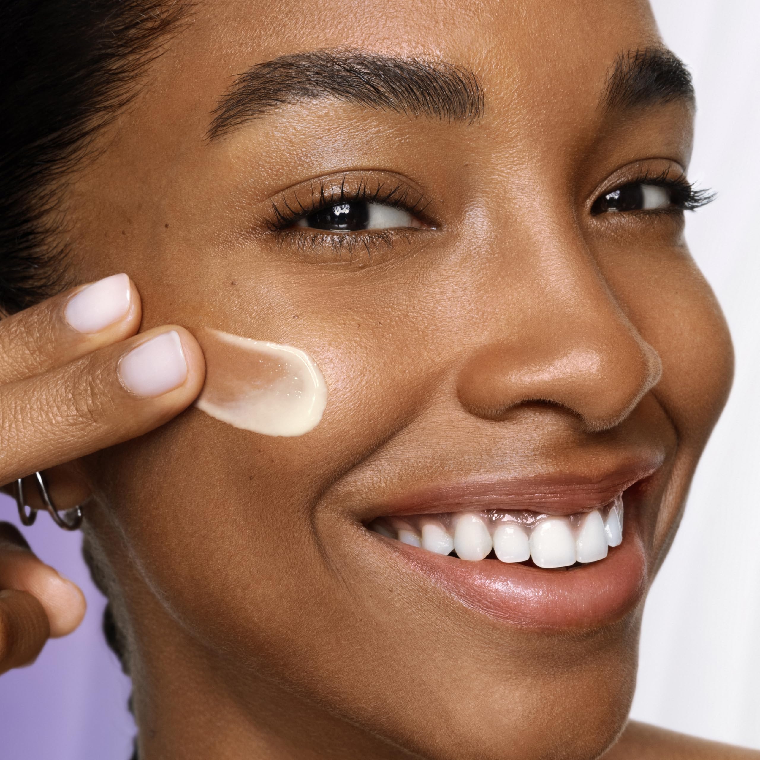 Lancôme silky serum texture on skin showing smooth application and absorption