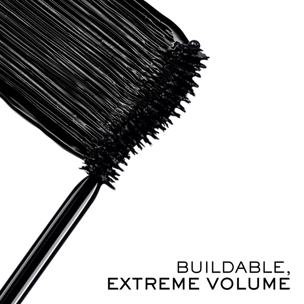 Lancôme S-shaped brush close-up demonstrating precise loading and separation
