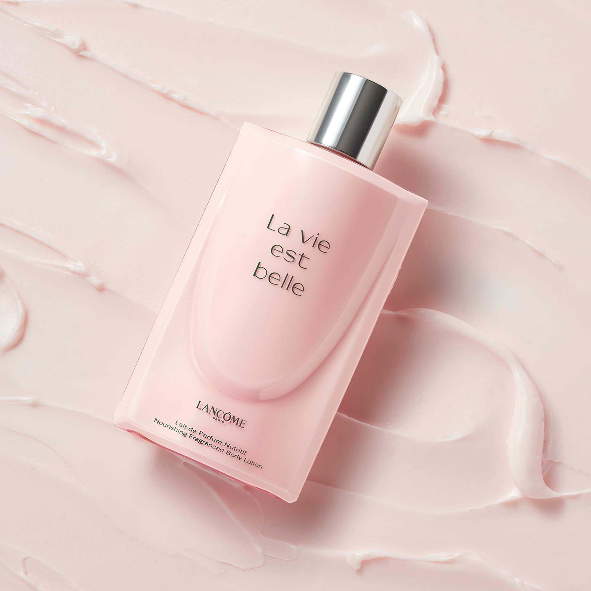 Lancôme La Vie Est Belle lotion applied in bathroom setting for moisturized skin benefit