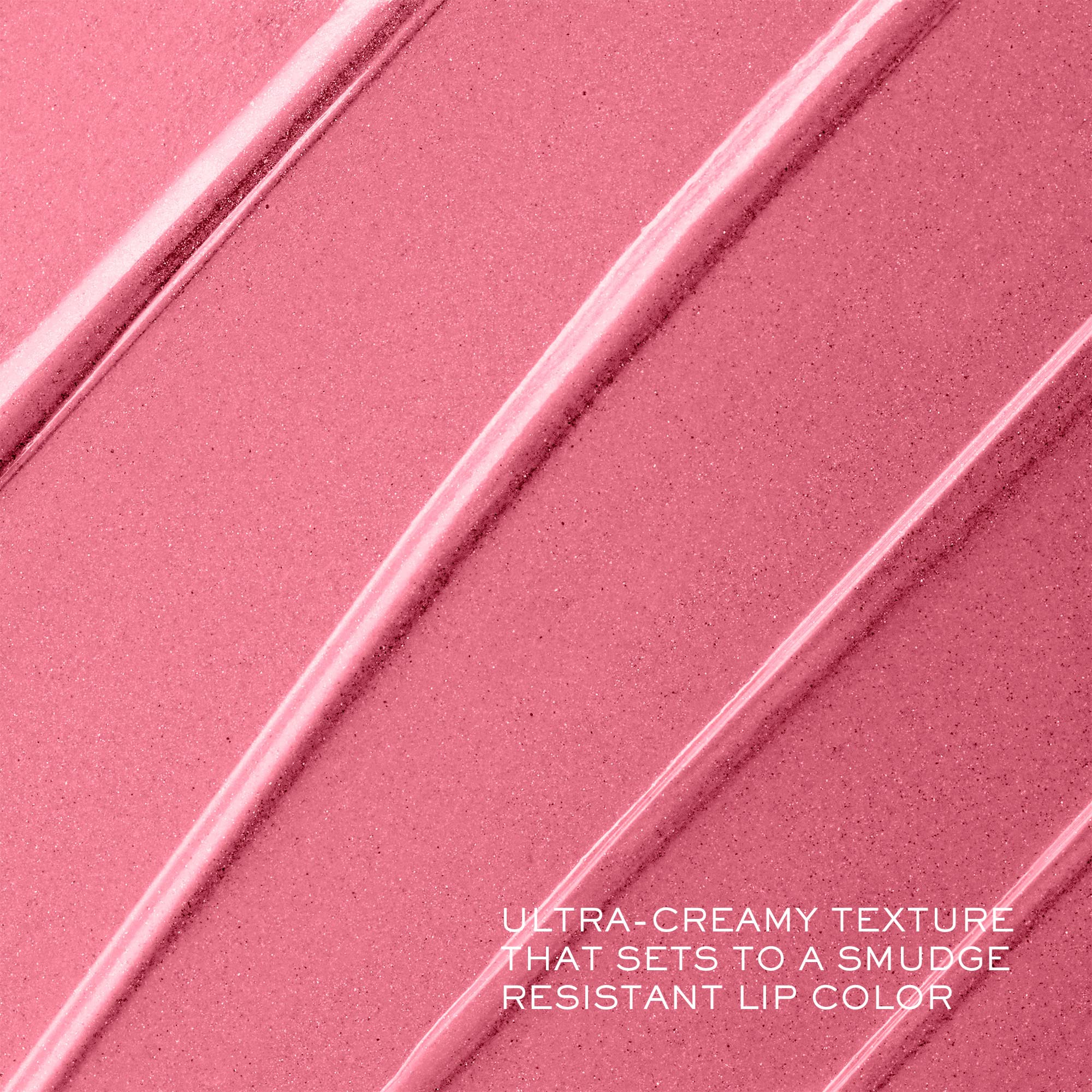 Lancôme lipstick held in hand illustrating size and portability