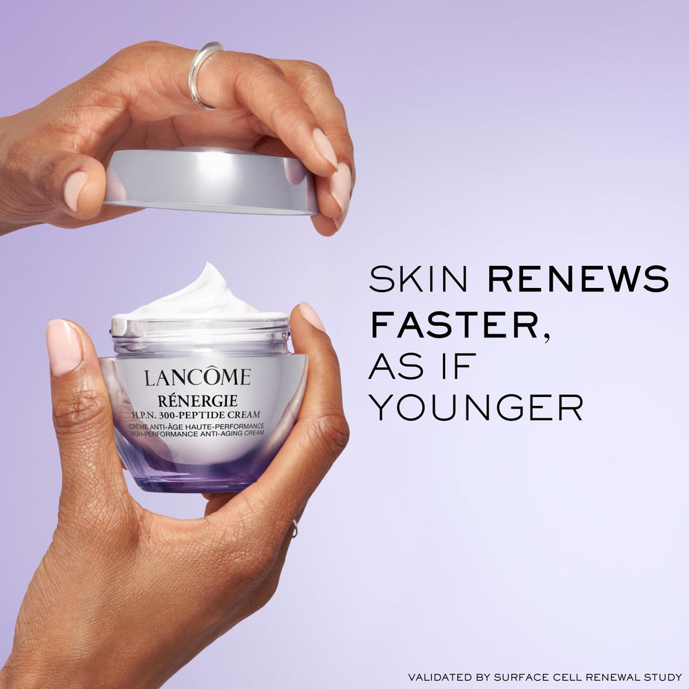 Lancôme cream on fingertip, demonstrates silky application and easy absorption