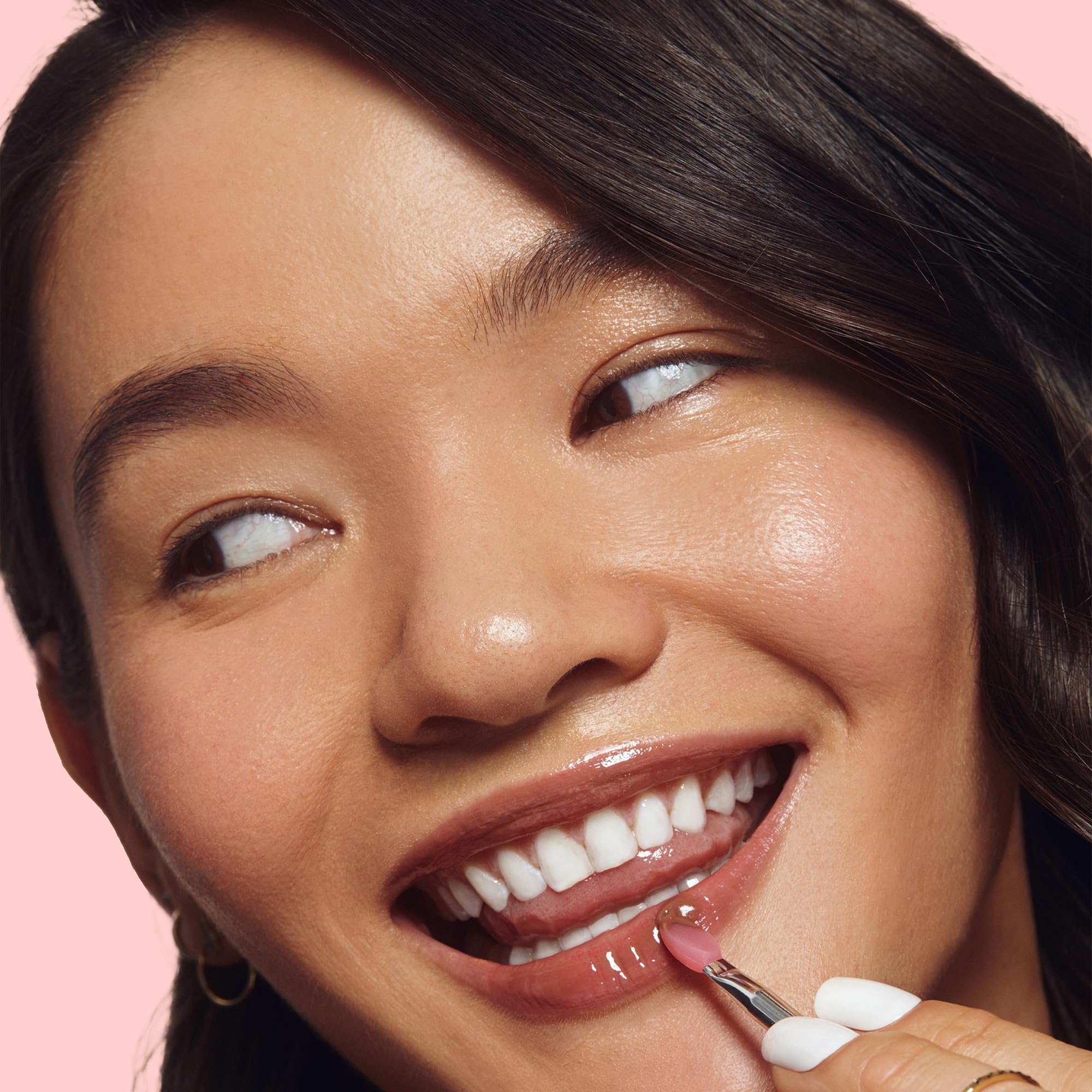 LANEIGE Lip Glowy Balm close-up stick delivering portable moisture and shine