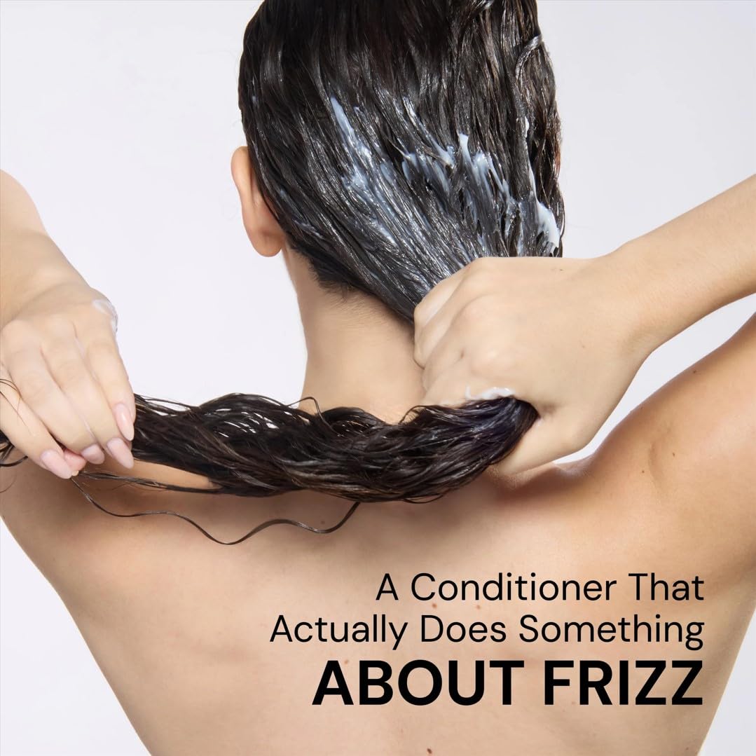 L'ANGE HAIR conditioner on bathroom shelf in styling routine for frizz control