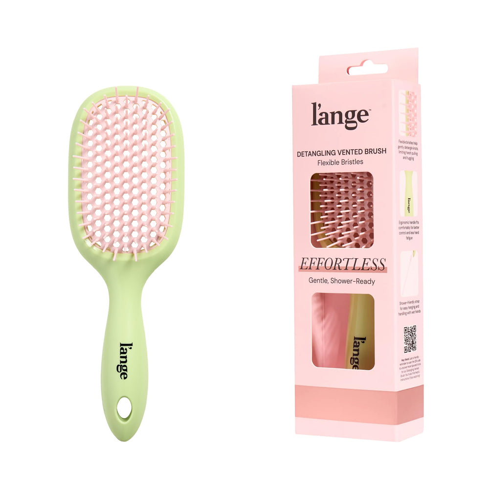 L'ANGE HAIR front view of green detangling brush showing shape and brand benefit
