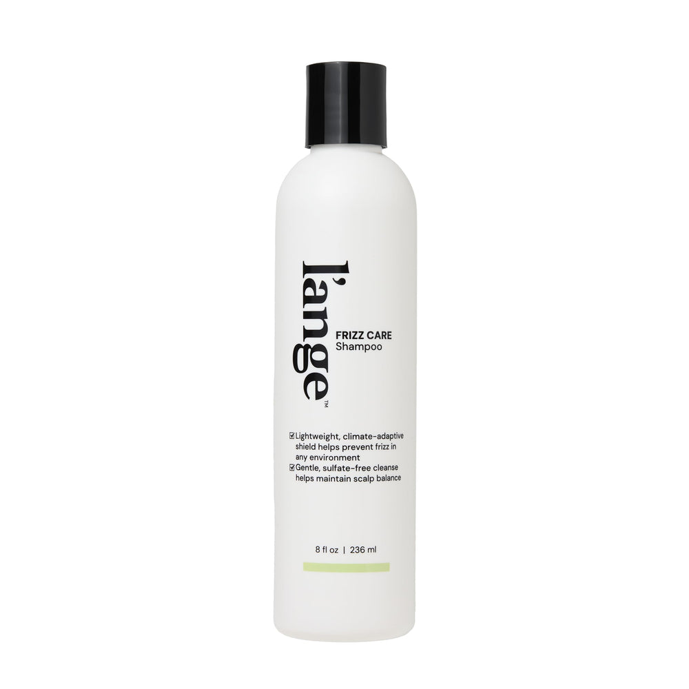 L'ANGE HAIR front bottle showing product and clear frizz-control benefit