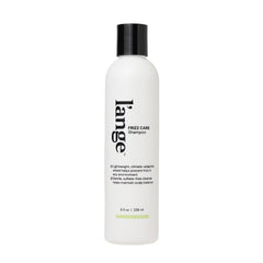 L'ANGE HAIR front bottle showing product and clear frizz-control benefit