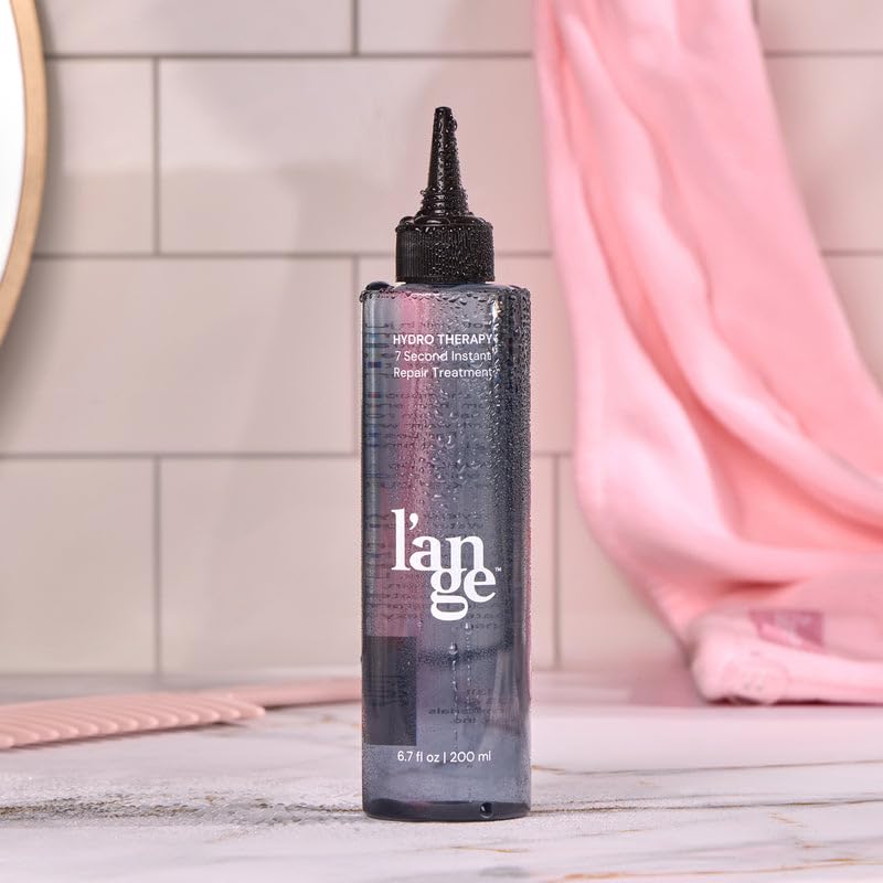 L'ANGE HAIR on bathroom shelf in lifestyle setting signaling easy daily styling use