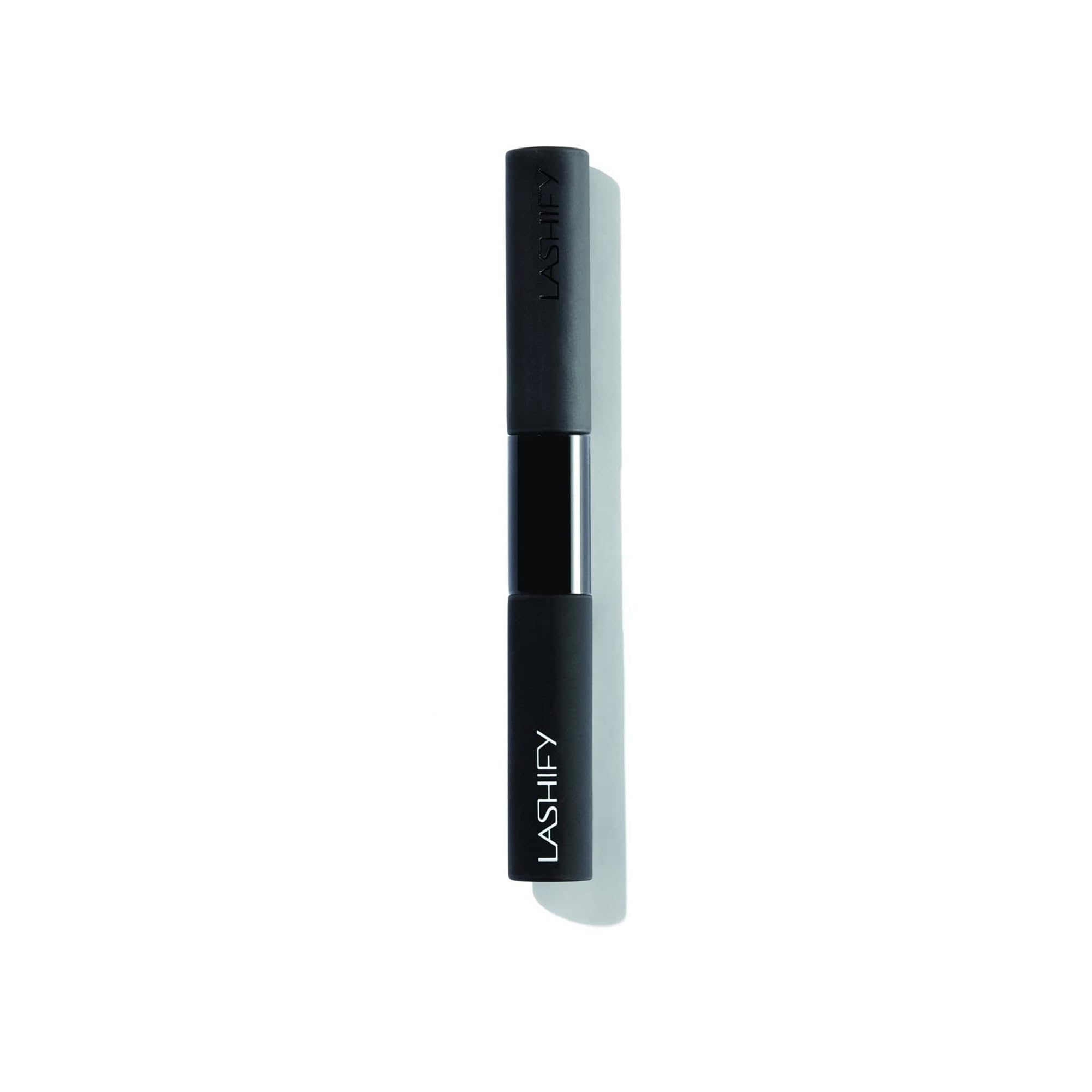 Lashify bottle next to Fuse Wand illustrating compact size and compatibility