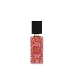 Lattafa Ajwad Pink to Pink front bottle view highlighting elegant design and compact size