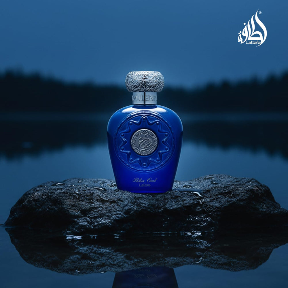 Lattafa Blue Oud near oud wood and spices showing raw-note inspiration
