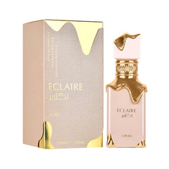 Lattafa Eclaire box and bottle angled to highlight packaging and gifting appeal