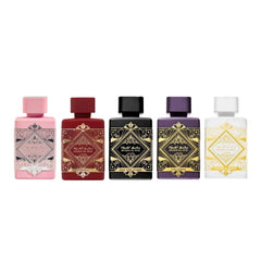 Lattafa five-piece travel set staged with a passport and toiletry bag for easy fragrance rotation