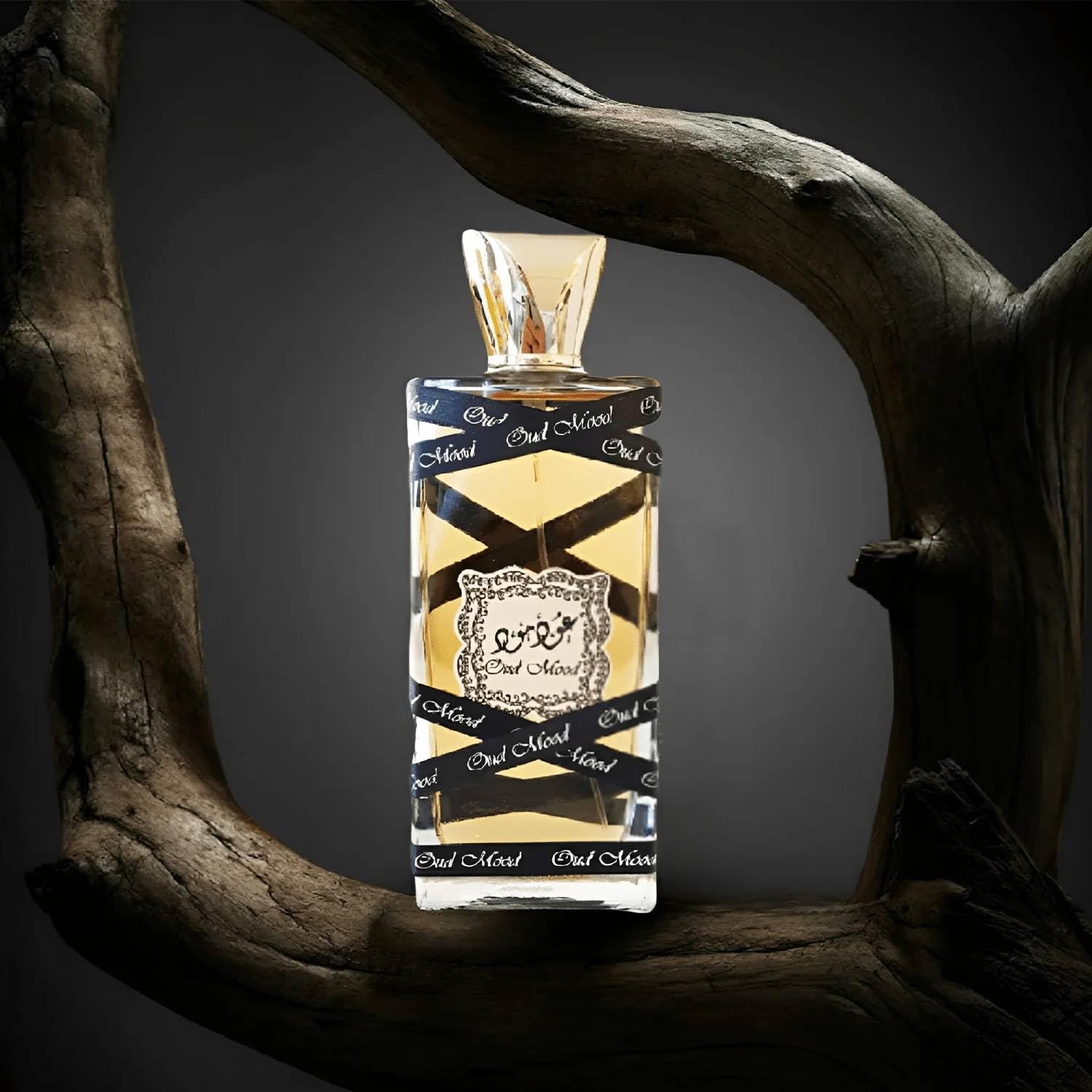 Lattafa Oud Mood bottle in evening outfit scene conveying warm fragrance benefit