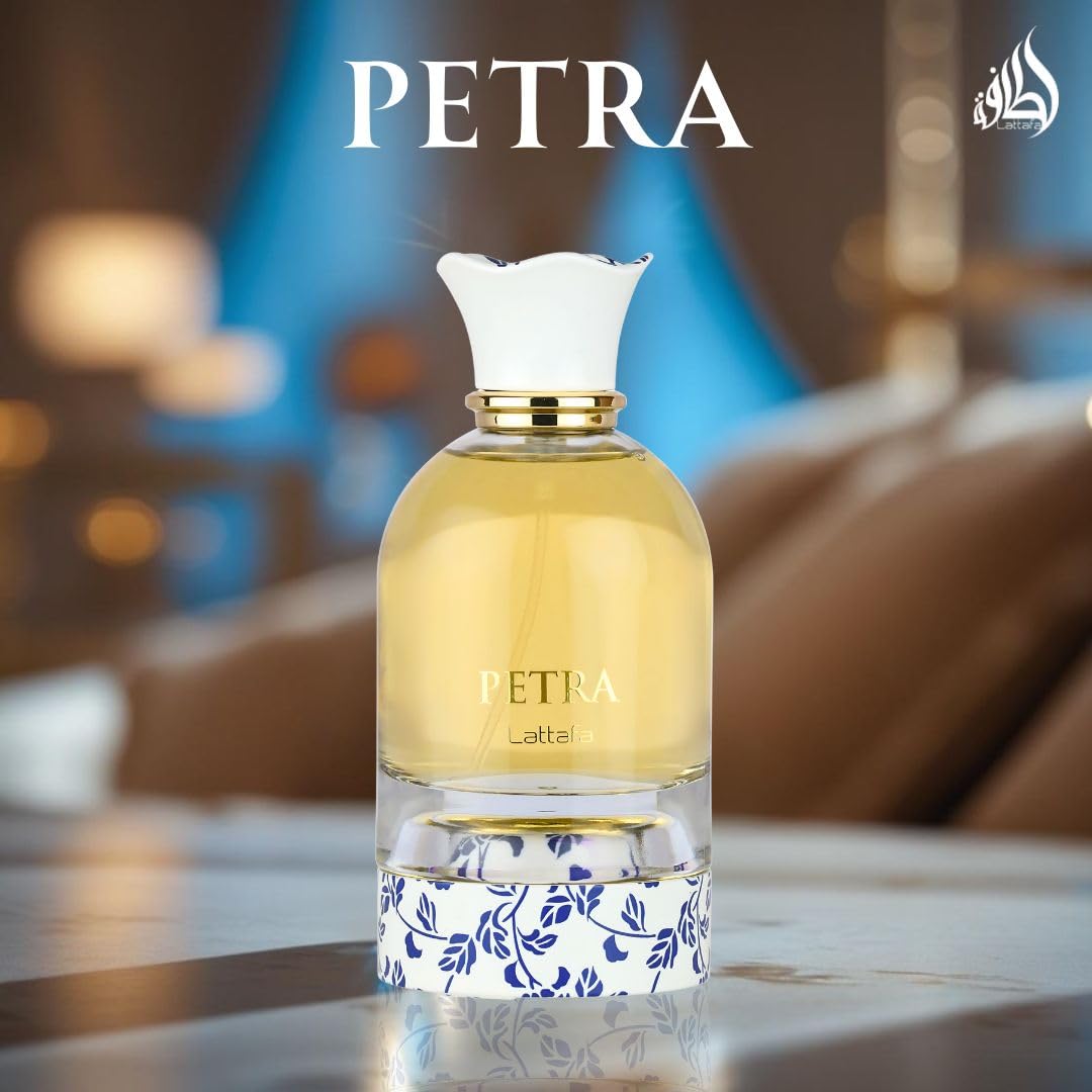 Lattafa Petra being spritzed on wrist demonstrating instant fragrance release