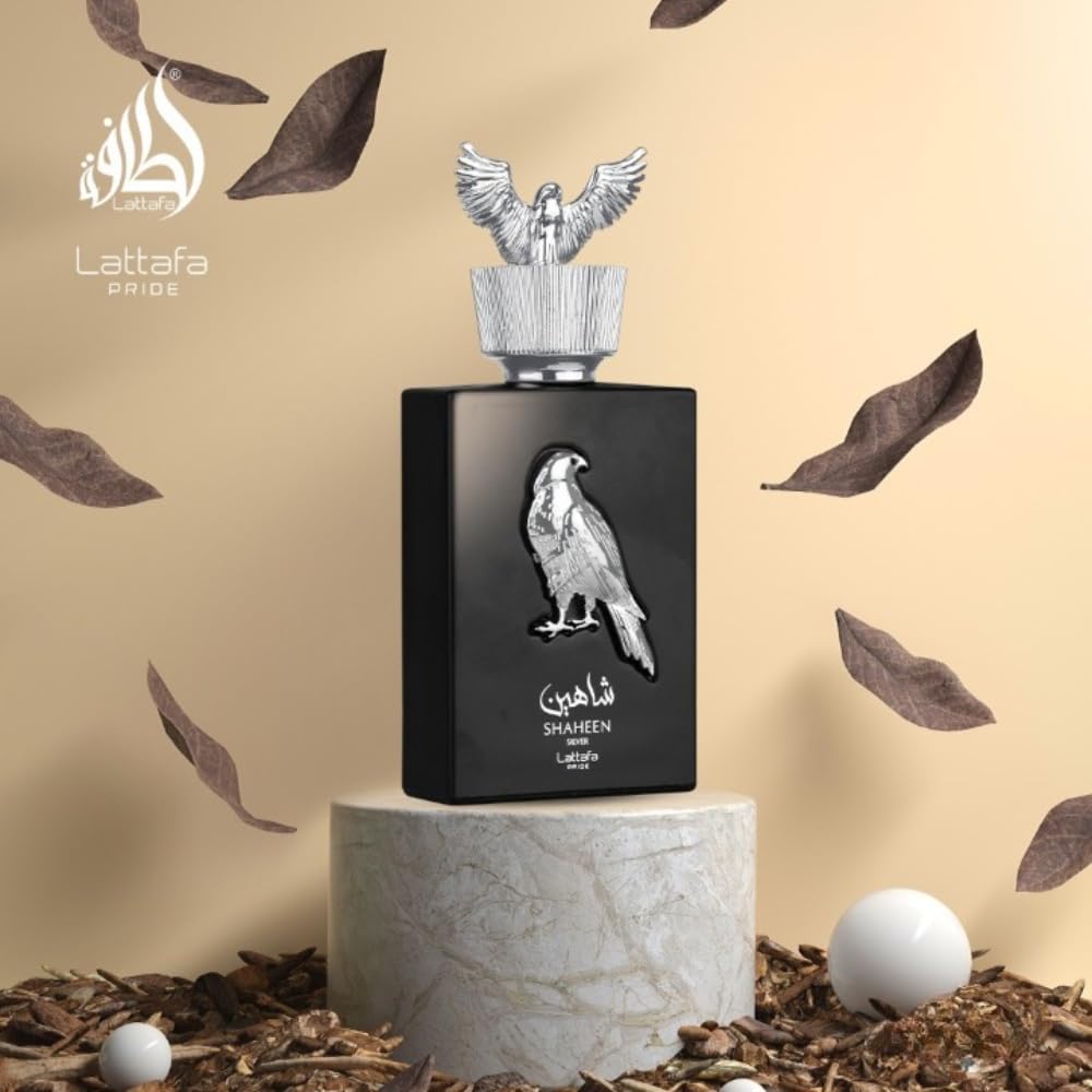 Lattafa Pride Shaheen Silver on dressing table in evening setting evoking sophisticated mood