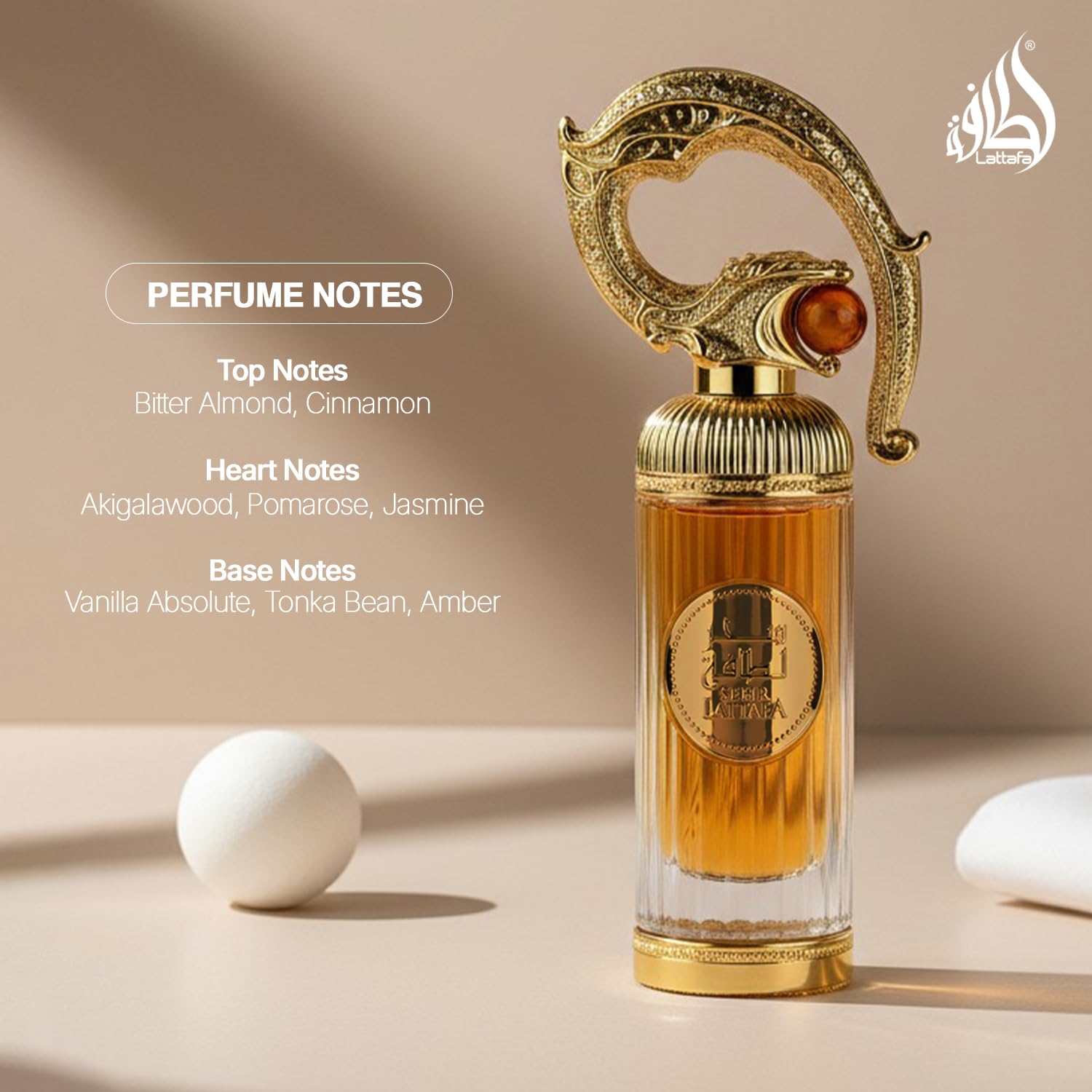 Lattafa Sehr fragrance atomizer in use on wrist, demonstrating easy controlled application