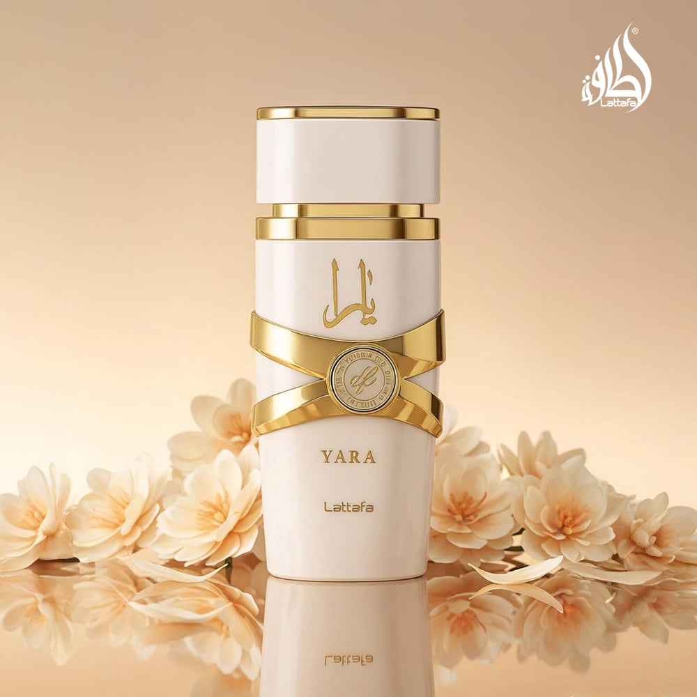 Lattafa Yara Moi held in hand to show 100 ml scale and convenient size