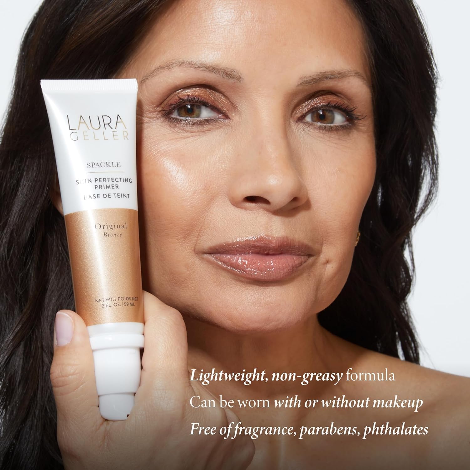 LAURA GELLER lifestyle model with subtle bronze glow highlighting hydrated skin