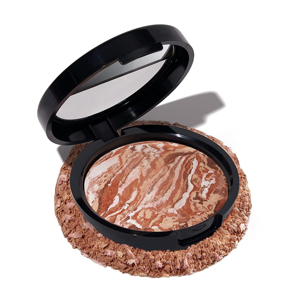 LAURA GELLER compact closed showing sleek branded front, travel-friendly convenience