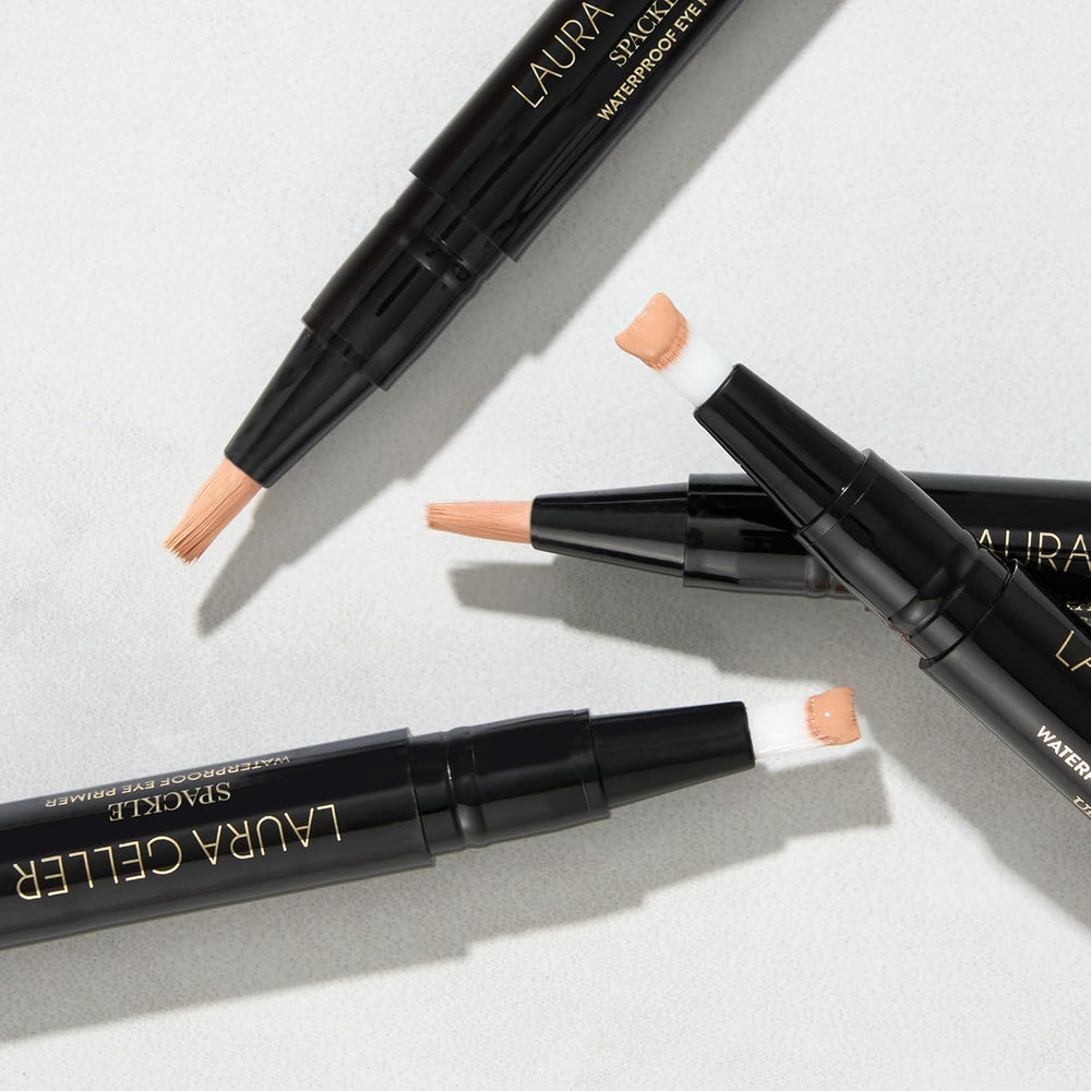 LAURA GELLER primer inside makeup bag suggesting all-day wear and portability