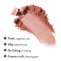 LAURA GELLER blush brush applying product showing smooth application benefit