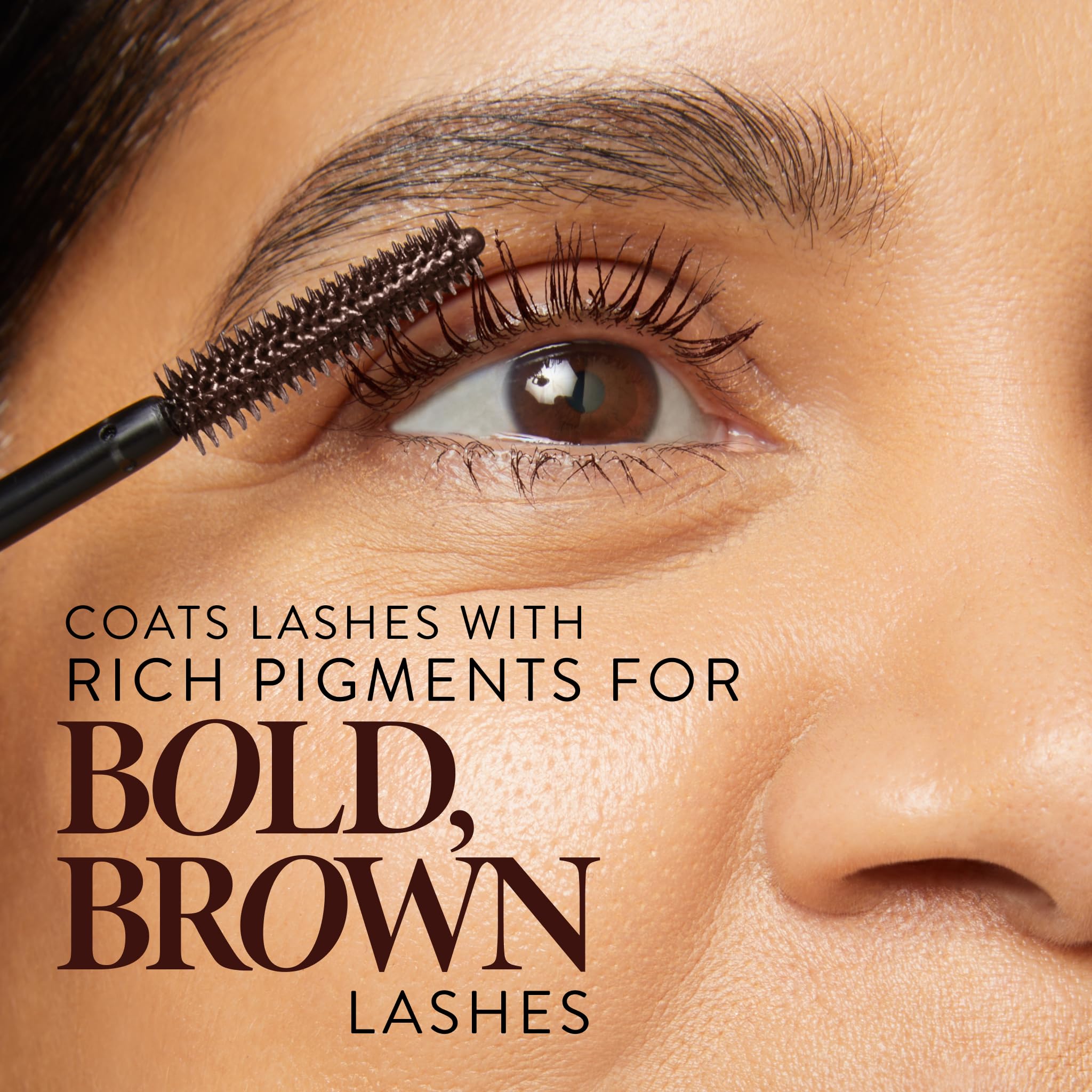 LAURA GELLER NEW YORK brown mascara swatch on arm showing buildable pigment