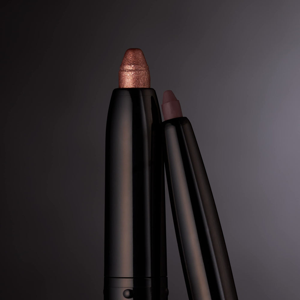 LAURA GELLER product on vanity styled with brushes showing everyday use