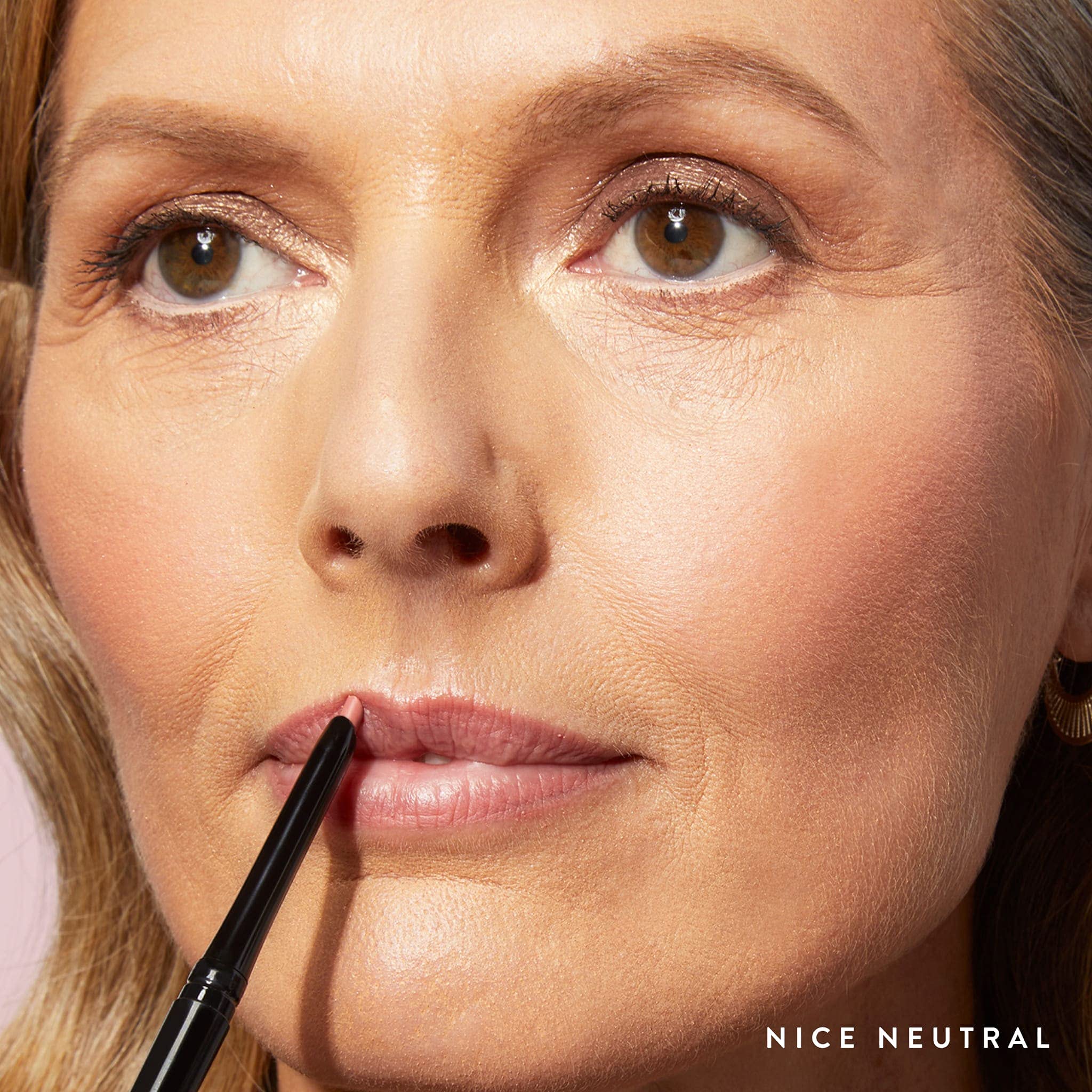 LAURA GELLER filled lips wearing liner alone to show long-lasting matte coverage benefit