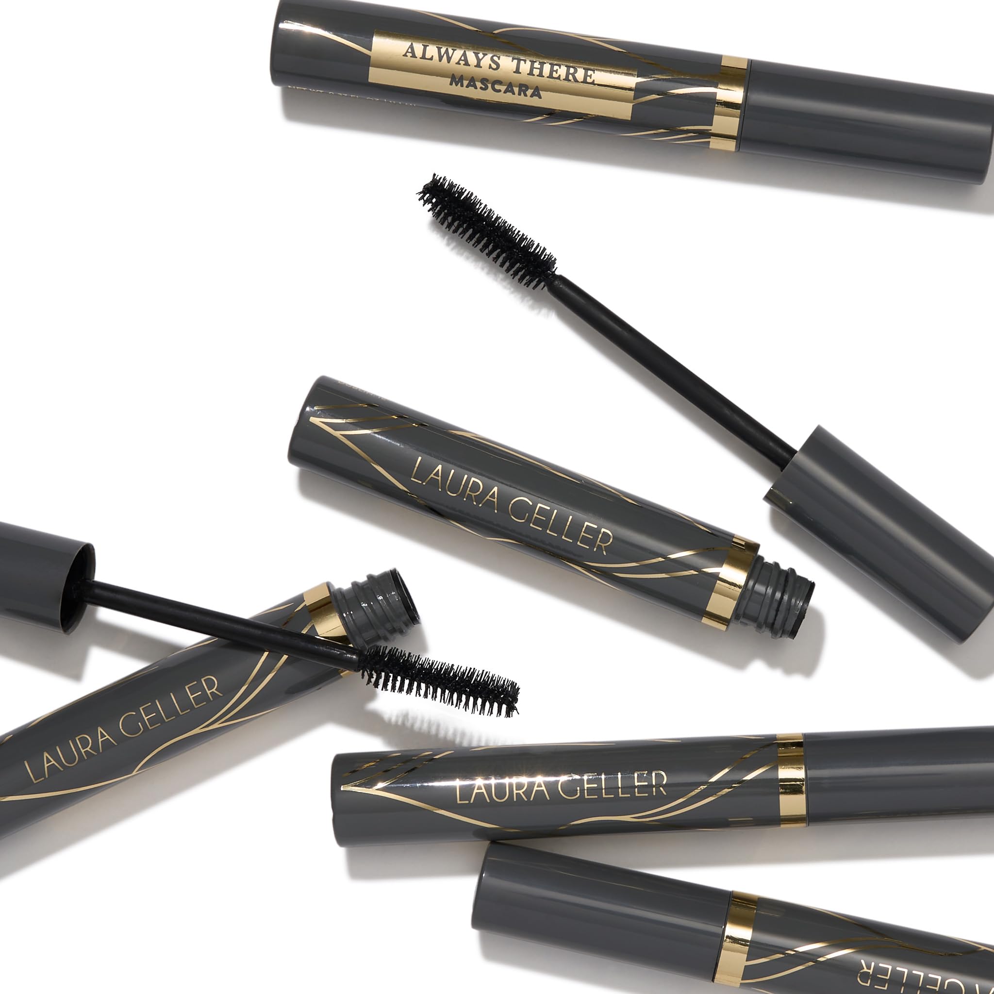LAURA GELLER NEW YORK applying mascara near eye to show curl and lift benefit